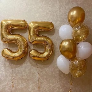 Фонтан с золотым конфетти и белыми шариками женщине на 55 лет