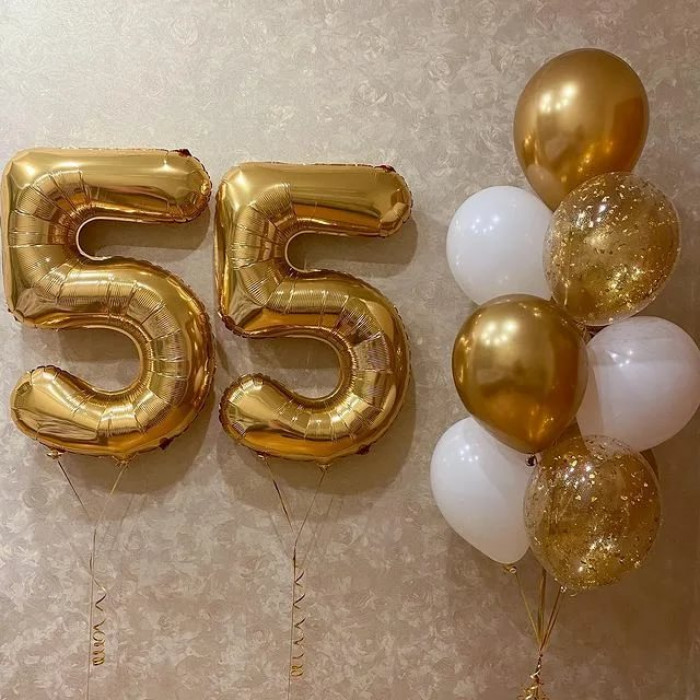 Фонтан с золотым конфетти и белыми шариками женщине на 55 лет