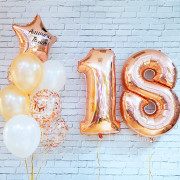 Композиция из воздушных шаров золотые 18 лет