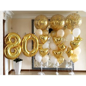 Композиция из золотых шаров конфетти и фонтанов на золотой Юбилей 80 лет