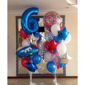 Композиция из воздушных шариков состоит из двух фонтанов с голубой Машинкой, цифрой и большим шаром с конфетти